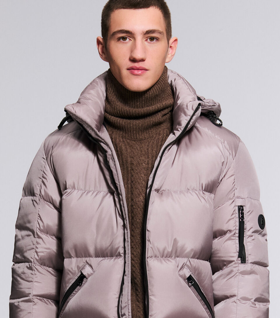 This male model is wearing the Jamy jacket with contrasting zips over the Eros knitted pullover.