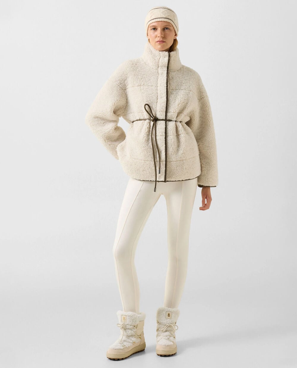 In this photo, the model is wearing the Kimberly jacket with the Kaela stirrup trousers and Chamonix boots.
