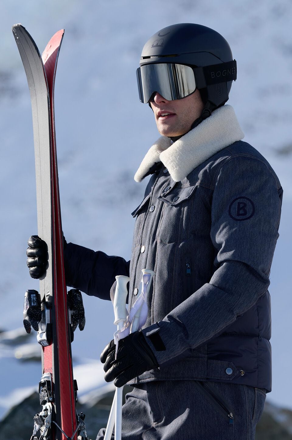 The model is pairing the Jeen outdoor jacket with the Cortina Pro 007 ski helmet and the Courchevel ski goggles.