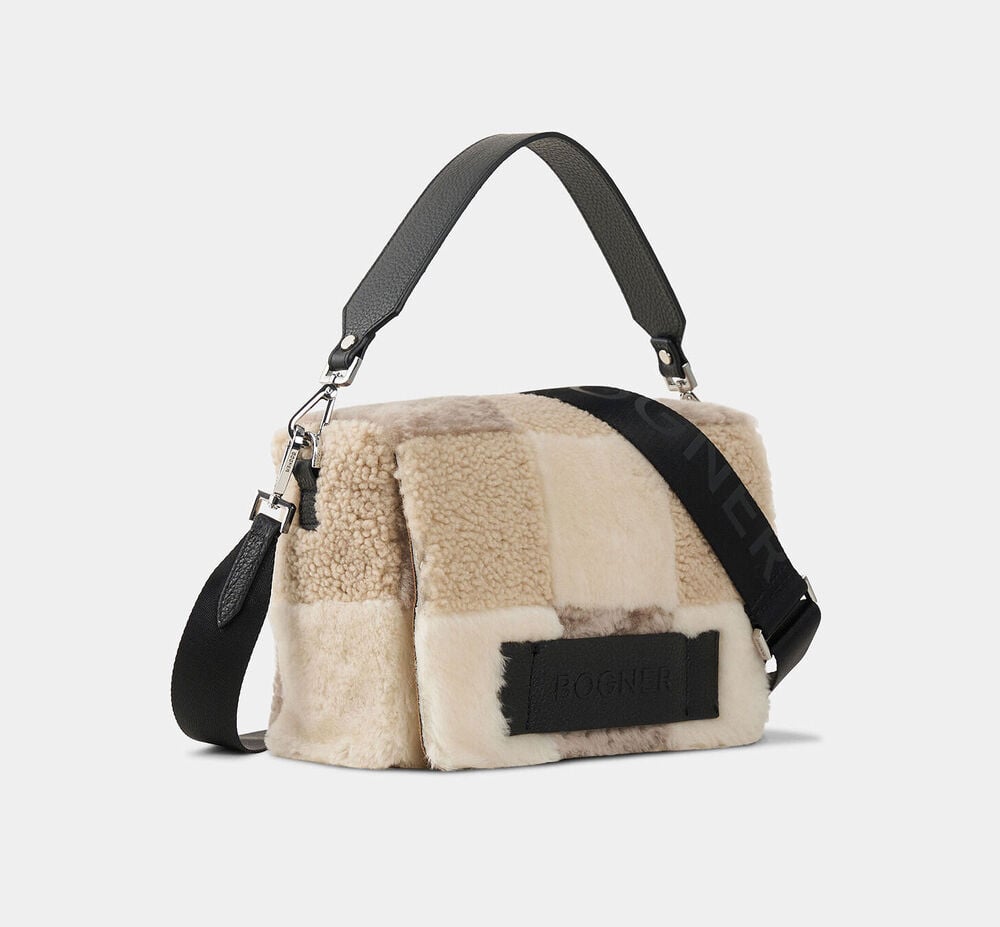 A patchwork-style handbag trimmed with lambskin, rectangular shape, with logo shoulder strap.