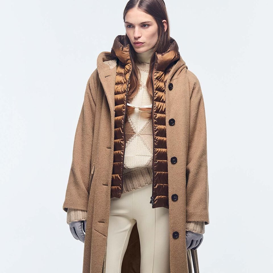 One of this season's colour themes: camel – seen here on a jumper, a shiny down gilet and a coat.