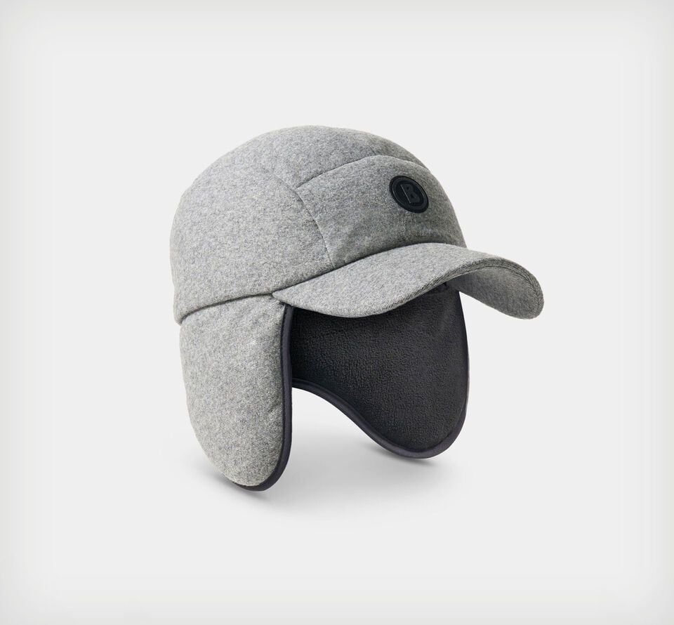 The image shows the Ricky down-padded cap with ear flaps, an adjustable back drawstring, and a signature logo detail at the front.
