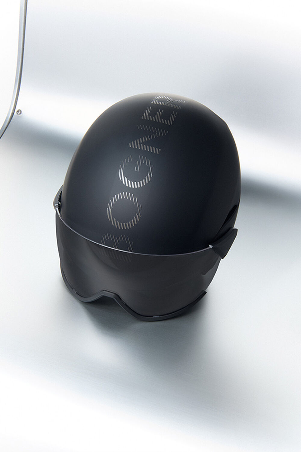  This black helmet with BOGNER lettering is placed on a white background.