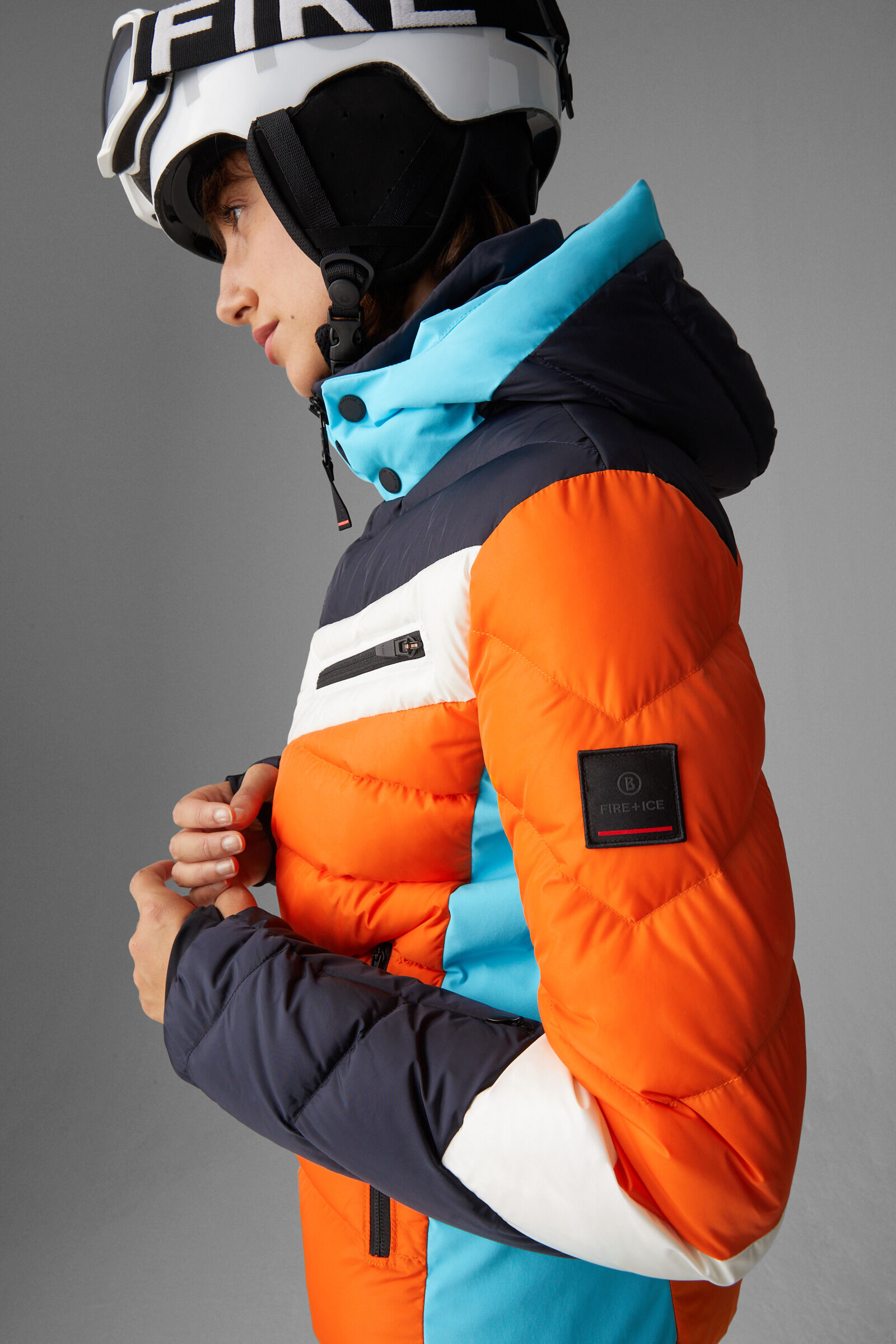 Orange and store blue ski jacket