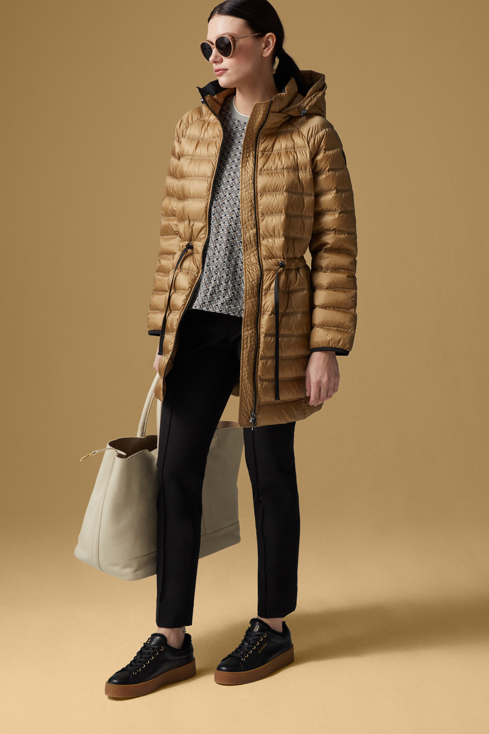 Lightweight down jacket clearance in a bag