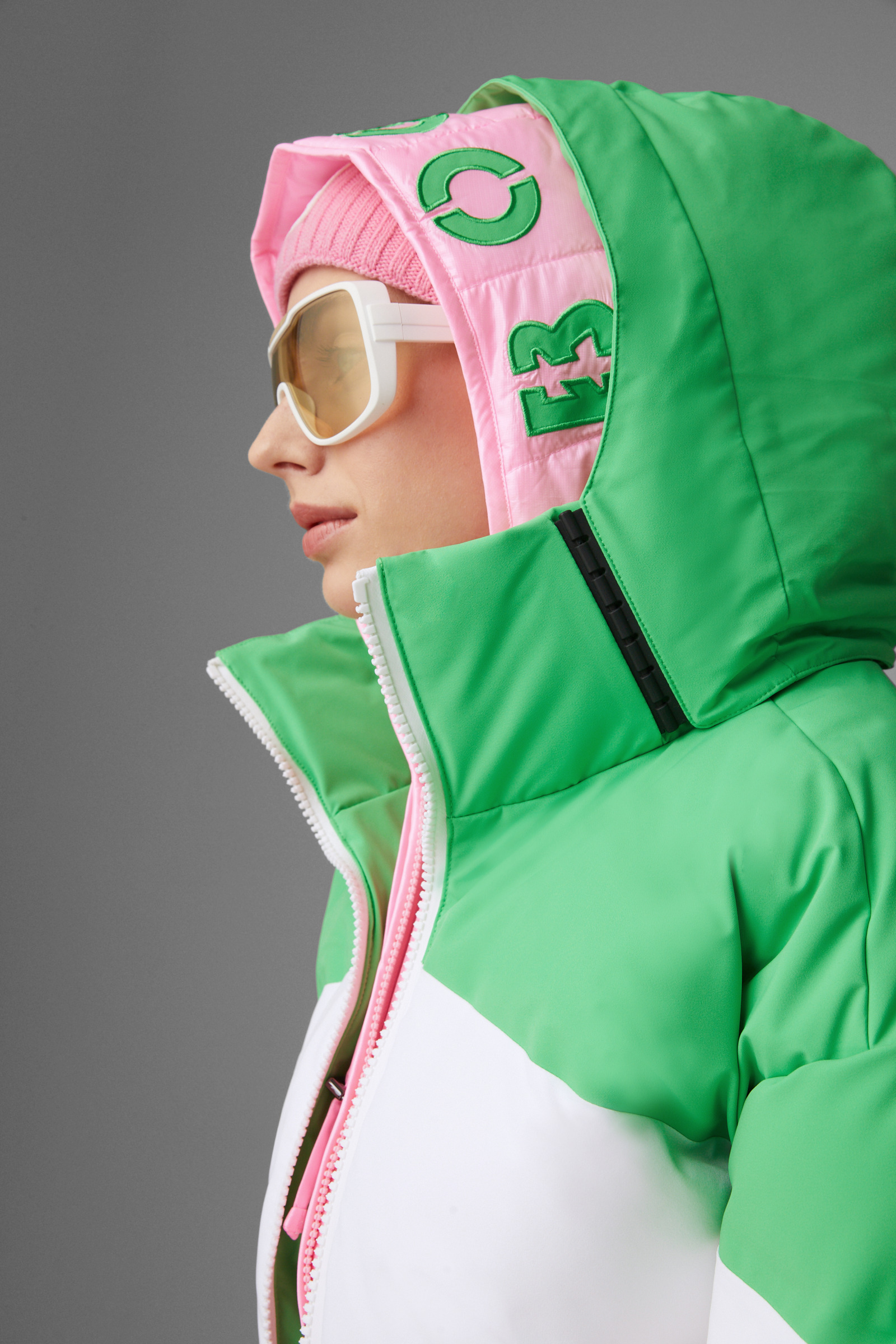Pink and green ski suit clearance